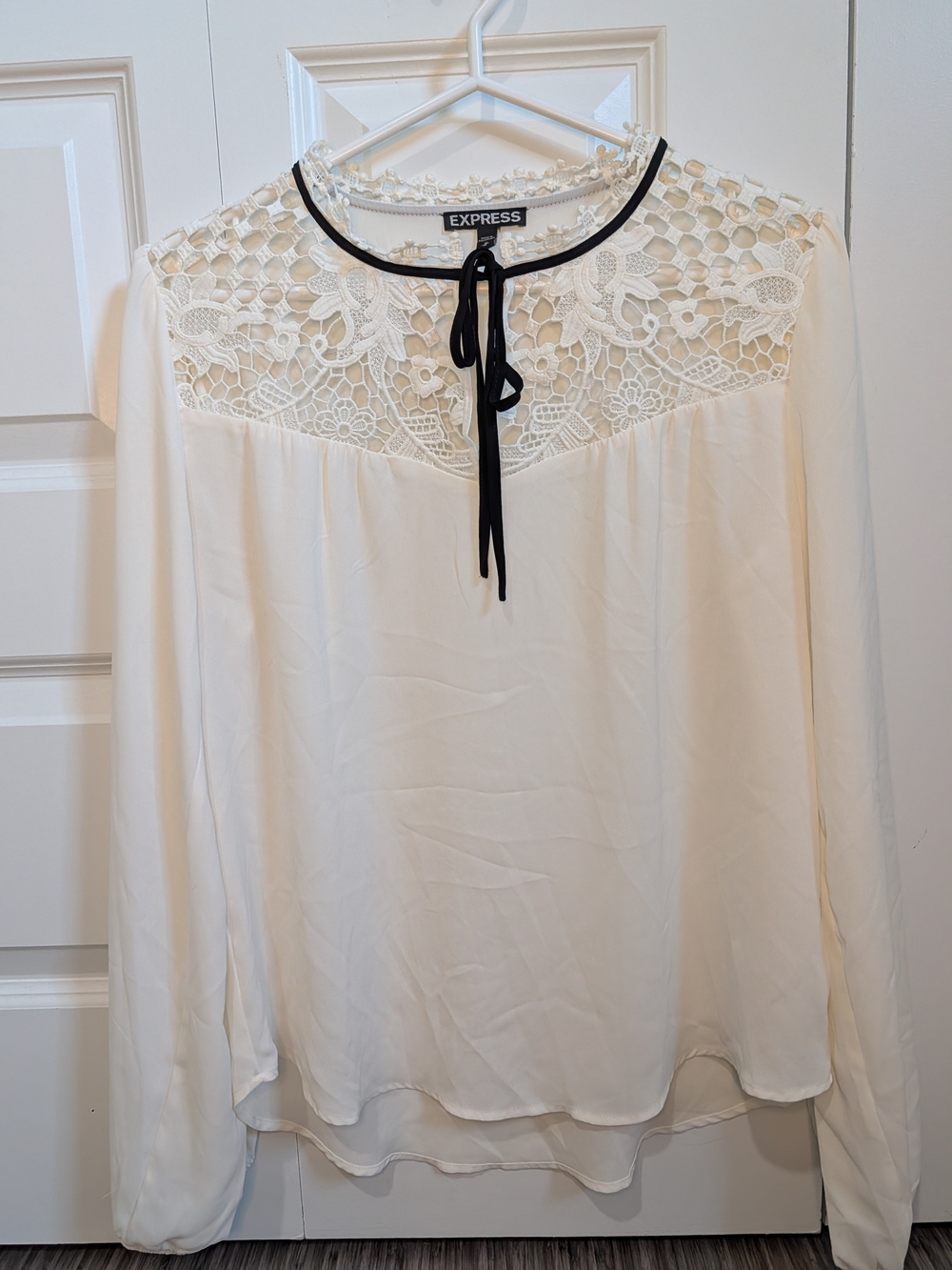 Express Cream Blouse with Black Neck Trim